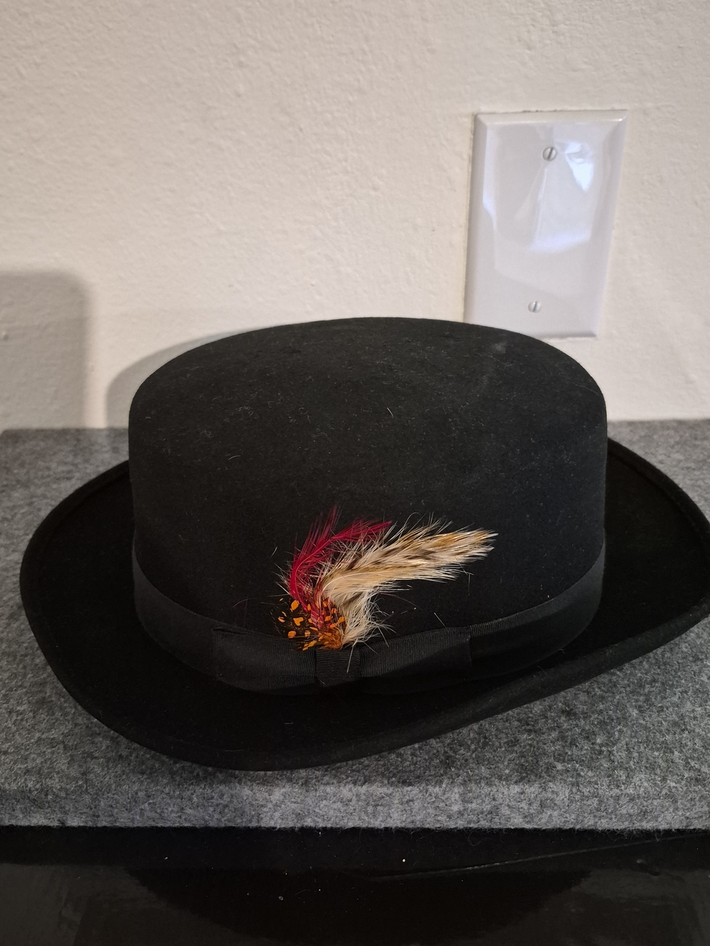 Classic Black Felt Derby Hat with Feather Accent